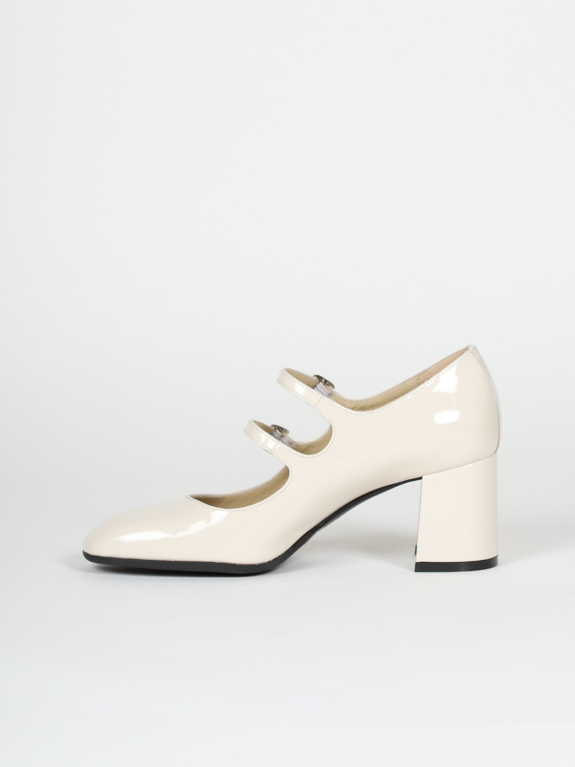 Beige patent leather Mary Janes