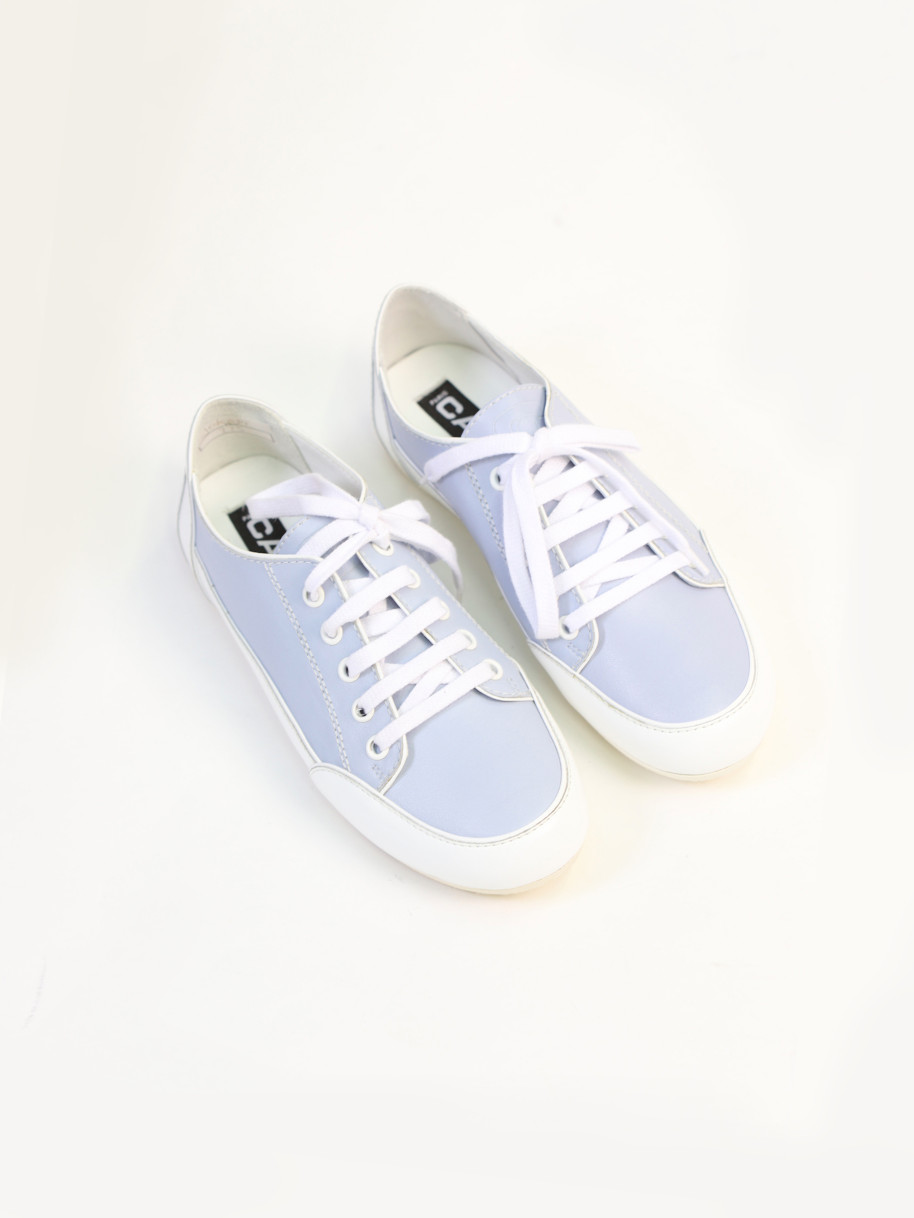 White and blue leather sneakers
